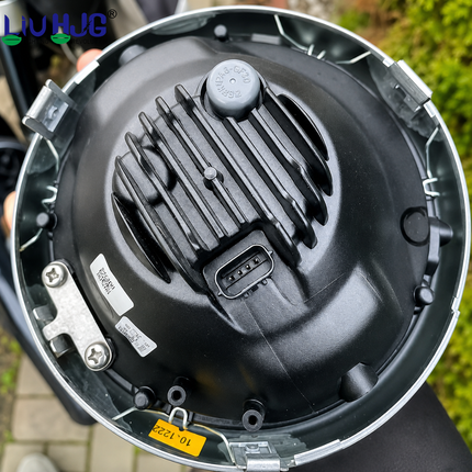 Top perspective view of LIU HJG 4-pin to H4 conversion cable showing H4 female block and 4-pin male plug.